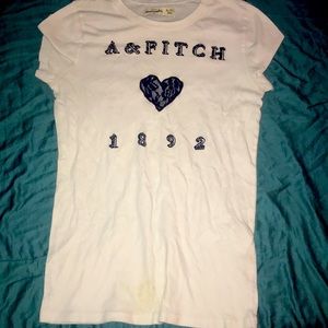 Abrocrombie and Fitch tee with navy blue lacing